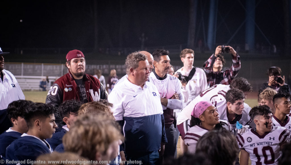 RHS Head Coach Kevin Scharton watches on as MWHS head Coach Natahan Camberlain encourages both teams to congratulate each other after the game